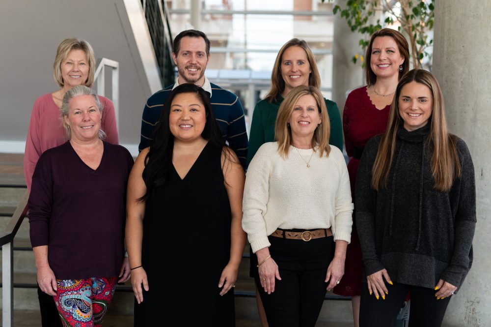 group photo of eight members of the Office of the Bursar and ecommerce & merchant services staff